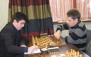 Richard Bates against Michael Adams in Round 3. Photo ©