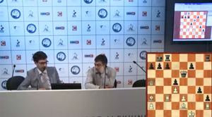 Fressinet demonstrates his win against Kramnik. Photo © 