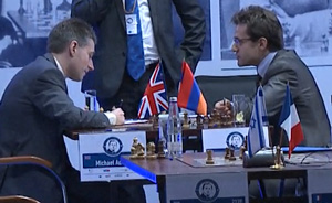 Adams and Aronian discuss draw game at the end. Photo © 