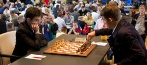 Maxime Vachier-Lagrave against Magnus Carlsen in Round 5. Photo © 