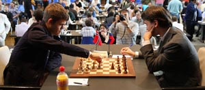 Carlsen playing Morozevich at last year's Biel tournament. Photo © 