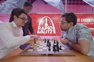 Caruana resigns in Round 16 against Aronian. Photo &copy; 