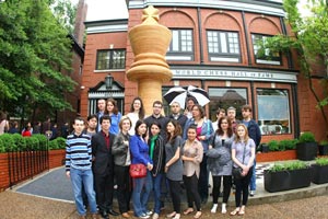 The players in front of St Louis' big King. Photo © 