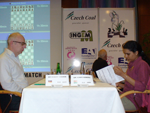 Robert Huebner and Humpy Koneru in Round 3. Europe-Echecs are on the spot making videos.