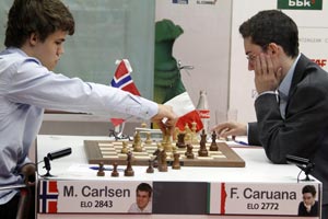 Magnus Carlsen beat leader Fabiano Caruana in Round 6. Photo © 