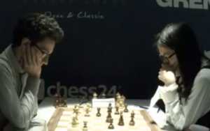 Fabiano Caruana managed to scrape a draw from a lost position against Hou Yifan. Photo © 