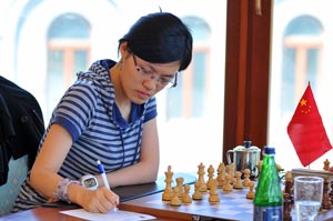 Hou Yifan in Round 7. Photo © 