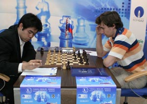 Nakamura and Karjakin drew in Round 8. Photo © Radu-Catalin Chirila. 