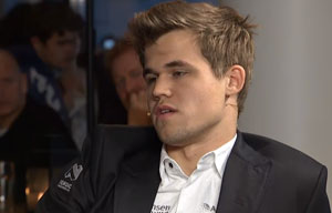 Magnus Carlsen in interview at the end was clearly very tired. Photo © 