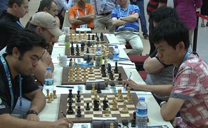 Nakamura against Wang Hao in the USA-CHN match Round 10. Photo © 