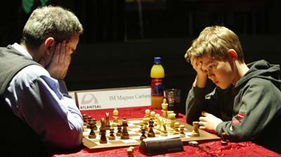 13-year-old Magnus Carlsen is bored playing with chess legend Garry Kasparov.  (2004) Via @karlniilo #motivationoftheday #positivityiskey…