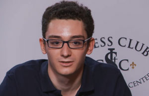 Winner Fabiano Caruana at the final press conference. Photo © 