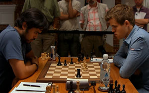 Hikaru Nakamura escaped with a draw against Magnus Carlsen from a lost position. Photo © 