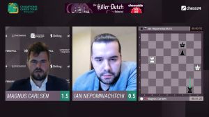 Carlsen and Nepomniachtchi at the end of game 3 where Carlsen just escaped. Photo ©