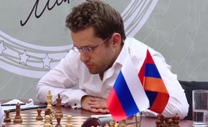 Levon Aronian leads alone after beating Svidler. Photo © 