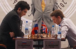 Vladimir Kramnik and Luke McShane concentrating hard on their Round 7 game that finished in a win for the Englishman. Photo © 