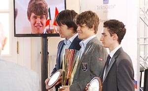 Winner Magnus Carlsen with Caruana and Radjabov with their trophies. Photo © 