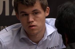 Carlsen listens to Nakamura after Tal Memorial Round 8. Photo © 