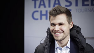 Magnus Carlsen appeared happy after his draw in round 12. Photo © 