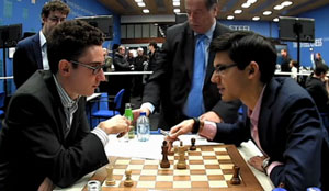 Caruana and Giri discuss their round 4 draw. Photo © 