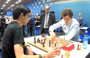 Magnus Carlsen in play against Anish Giri in the first tie-break game. Photo © 