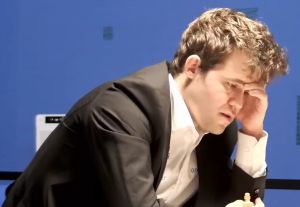 Magnus Carlsen beat Richard Rapport to join the leaders. Photo © 