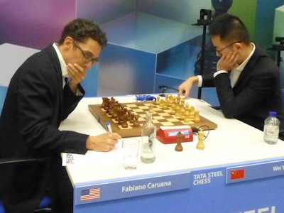 Wei Yi against Fabiano Caruana Tata Steel 2025 Round 1 Photo © Michiel Abeln.