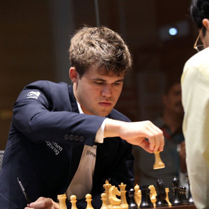 Viswanathan Anand and Magnus Carlsen of Norway during their Tenth match at  FIDE World Chess