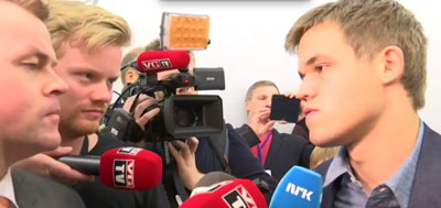 Magnus Carlsen in a press scrum