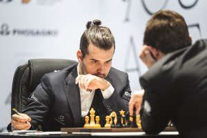 Ian Nepomniachtchi at the board during game 3. Photo © 