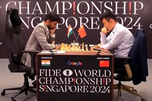 Gukesh and Ding in play during game 1. Photo © 