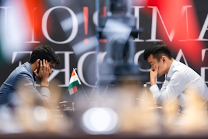 Gukesh and Ding in play during game 2. Photo © FIDE taken from their press release.