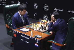 Candidates Round 9 — Giri beats Wang Hao