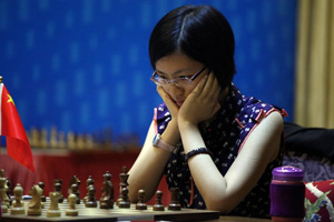 Hou Yifan won game one. Photo © Anastasiya Karlovich. 